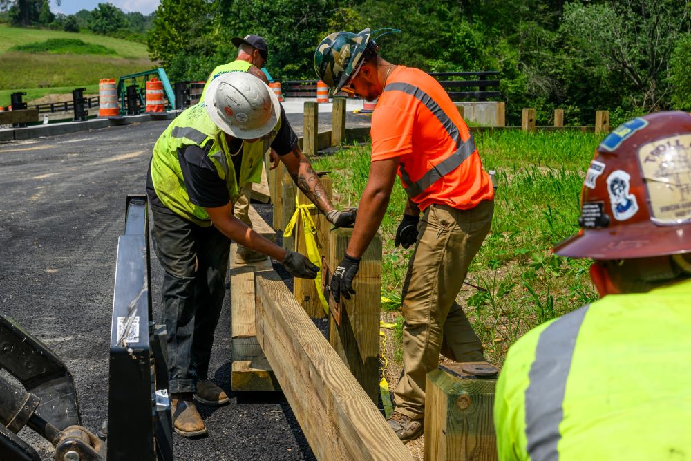 Timber Rail Men Working